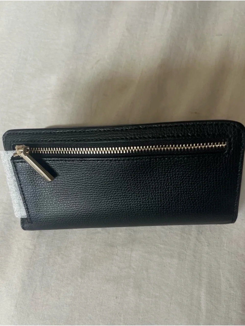 kate spade Black Pebbled Leather Zip-Around Wallet with Gold Logo